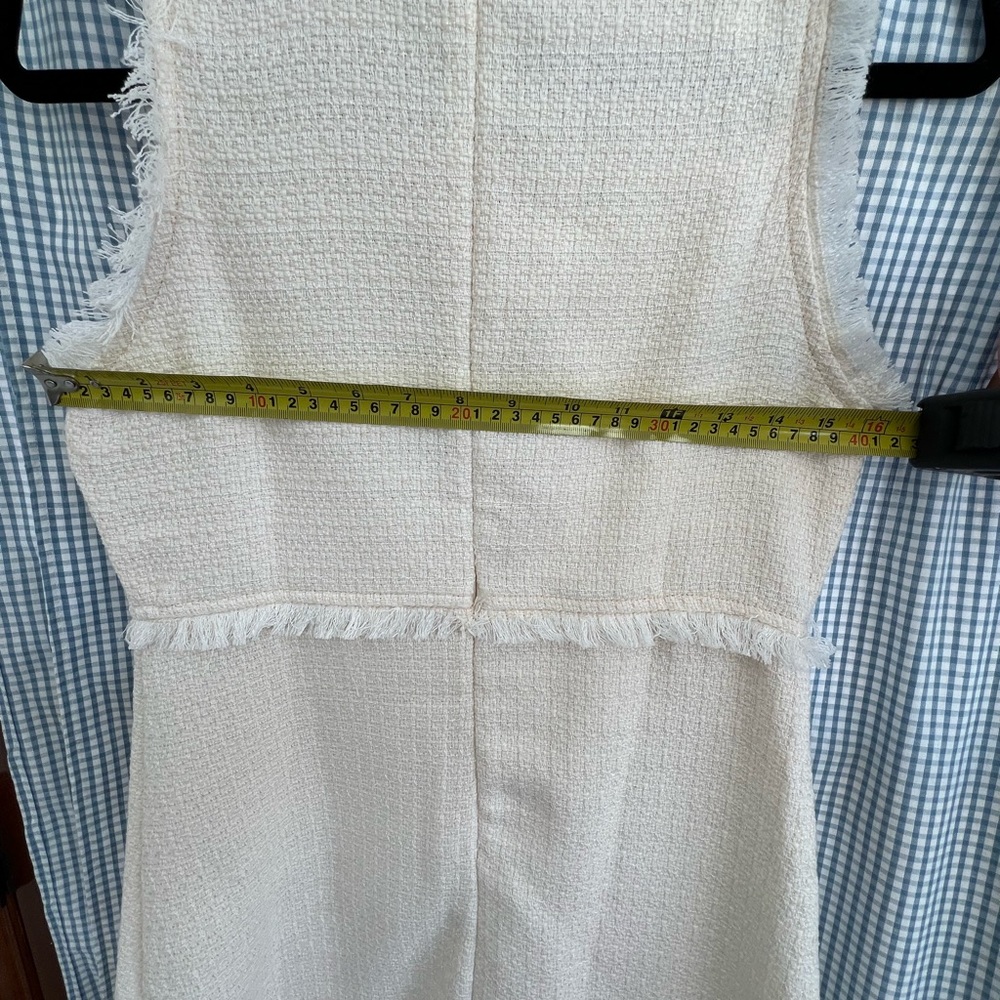 Elegant Cream Sleeveless Dress with Black Bow - Picture 4 of 5